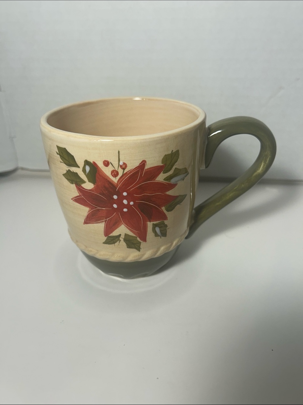 Ambiance Ceramic Mug with Red Poinsettia and Olive Handle 4 inches high